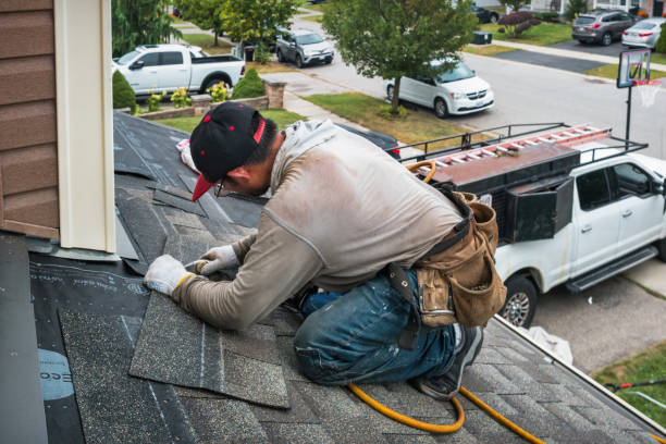 Professional Roofing technician working in Whiting, WI